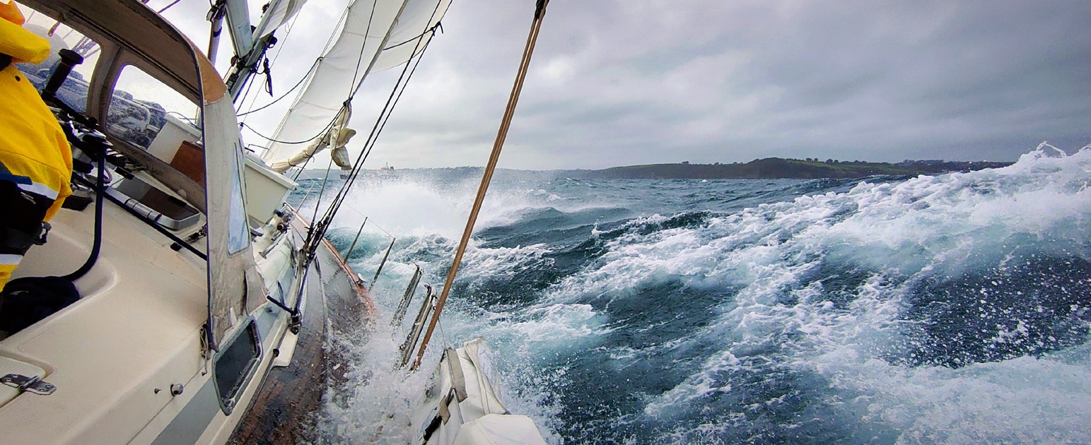 Cherokee sailing into Falmouth - stormy weather